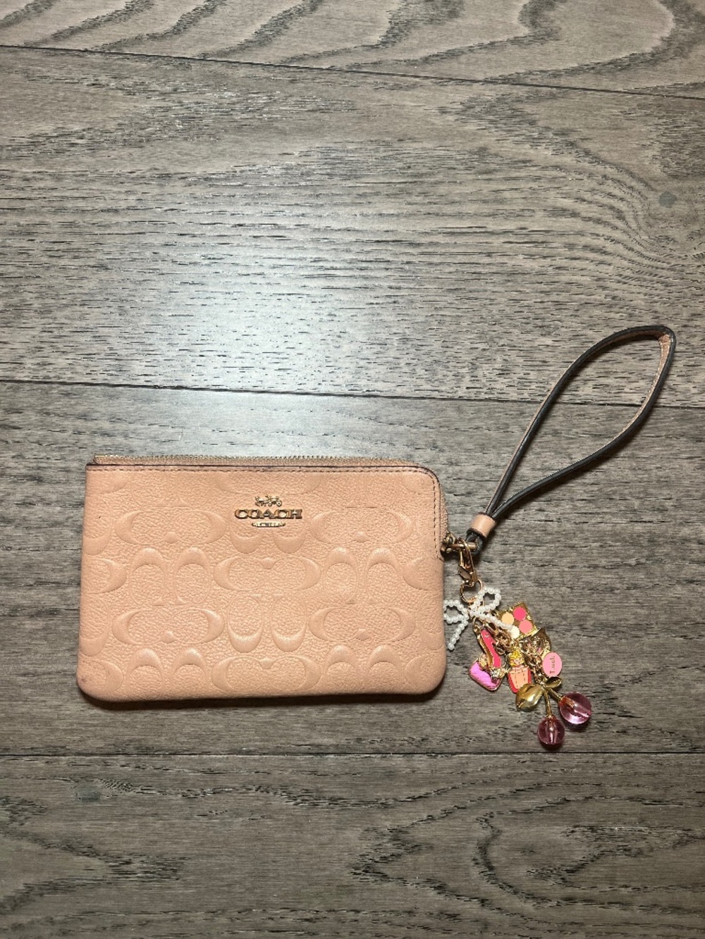 Coach Embossed Signature Wristlet